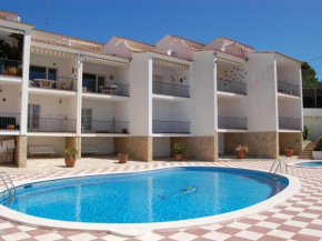 CABIONI - casa adosada con piscina comunitaria, cerca de la playa de Grifeu. - ES-228-39